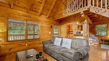 Cabin, 1 Queen Bed with Sofa bed, Hot Tub | Living area | 50-inch flat-screen TV with digital channels, TV, fireplace
