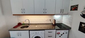 Fridge, oven, toaster, cookware/dishes/utensils
