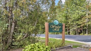 A sign for Windsor Hill with a natural backdrop. - Cozy condo in Waterville Valley NH.  (Waterville Valley)