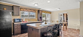 Charlie's Cove | Central Chincoteague Home w/ Fenced Yard, Soaking Tub, Den & Pet Friendly Stay