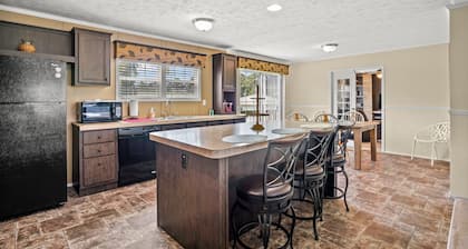 Charlie's Cove | Central Chincoteague Home w/ Fenced Yard, Soaking Tub, Den & Pet Friendly Stay