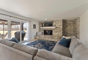 Smart TV, fireplace, DVD player, books