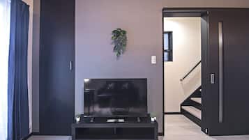 Superior Villa | Living room | 32-inch TV with digital channels