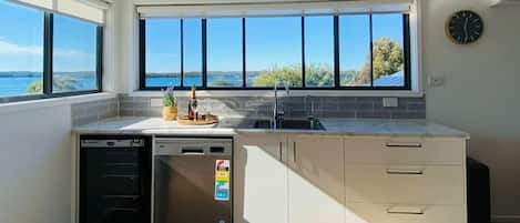 Coffee/tea maker, fridge, microwave, oven