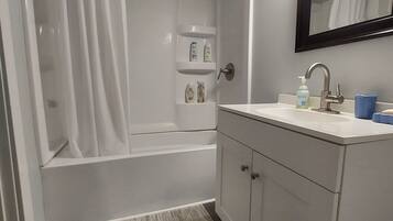 Jetted tub, hair dryer, towels, soap