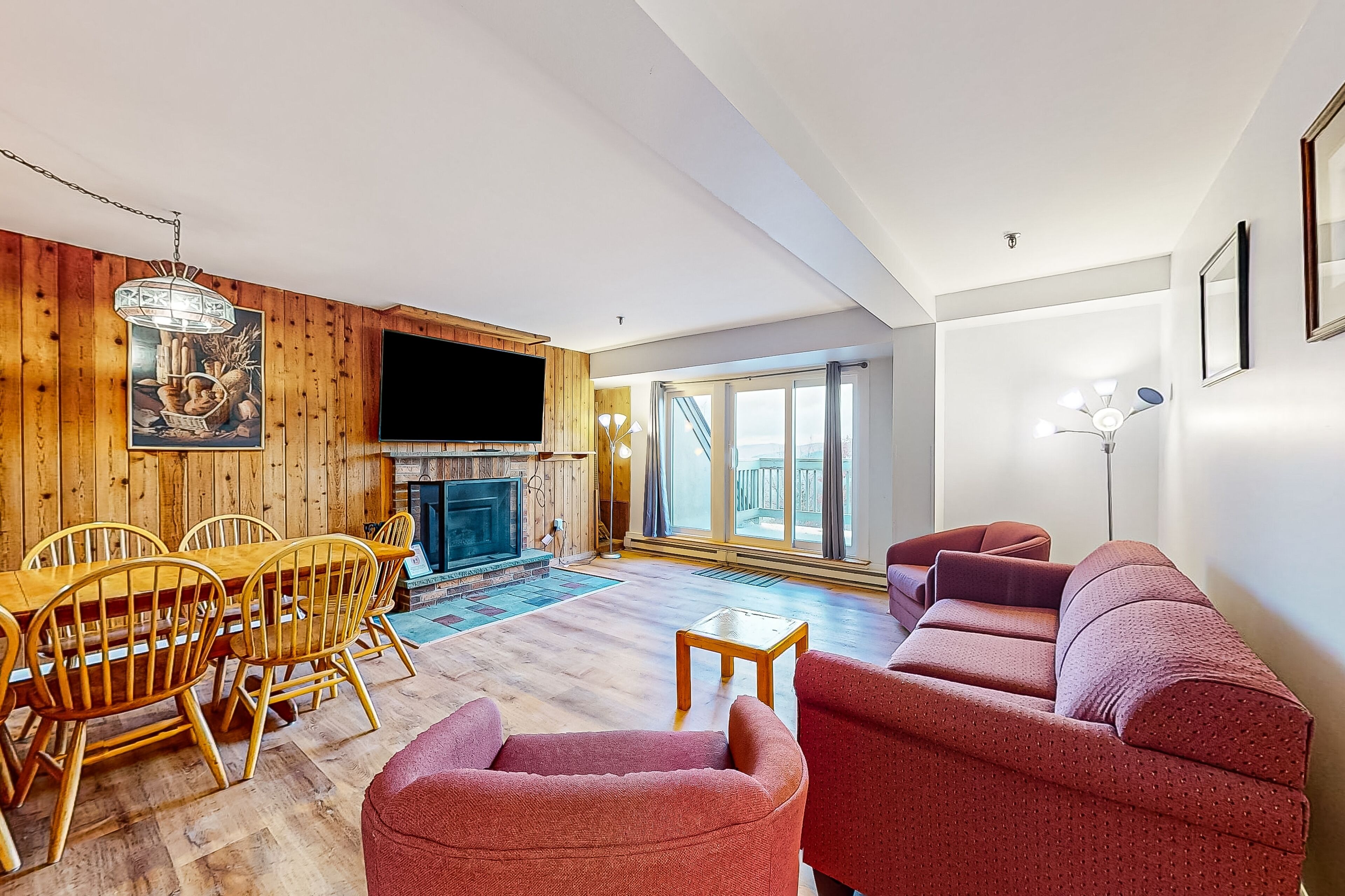 Mountain side condo with easy ski and trail access - fitness center & grill area