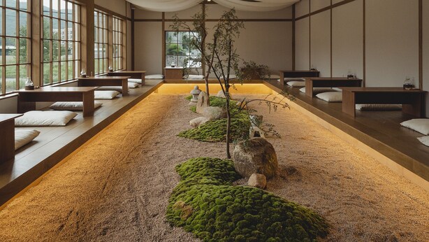 A serene indoor garden with a long bench, a small tree, and a rock garden. - uonstay (Gyeongju)