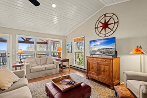 Smart TV, fireplace, books