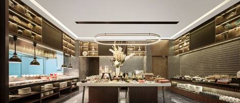 A modern kitchen with a central island, built-in shelves, and pendant lighting.