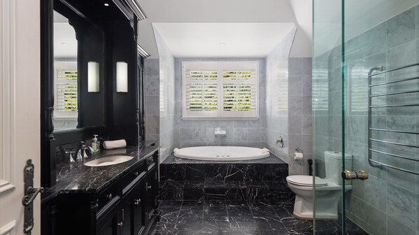 Bathtub, hair dryer, towels