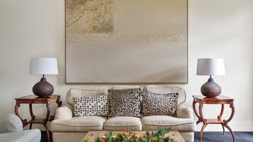 TV, fireplace, books