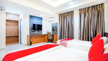 Suite Superior | 1 kamar tidur dan seprai linen