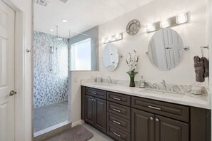 Bathtub, hair dryer, towels, soap