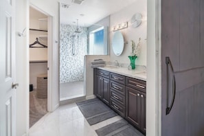 Bathtub, hair dryer, towels, soap