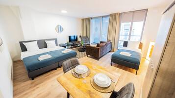 Basic Studio | Living area | 40-inch LCD TV with digital channels, heated floors, streaming services