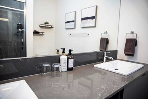 Bathtub, hair dryer, towels