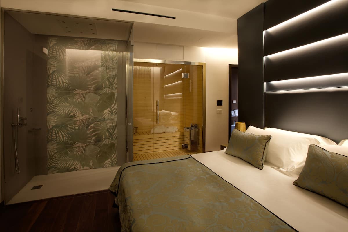 Suite, Sauna | 1 bedroom, premium bedding, down comforters, minibar