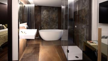 Designer toiletries, hair dryer, bathrobes, slippers