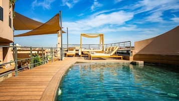 Outdoor pool, open 8:00 AM to 7:00 PM, sun loungers
