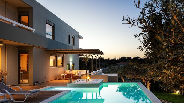 A modern house with a swimming pool, outdoor seating, and a pergola. - Rizes Villa with Jacuzzi & Heated Pool, A Nature Paradise! (Rethymno)