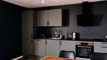 Estudio estándar | Cocina privada | Refrigerador con congelador, horno, parrilla de estufa y lavavajillas