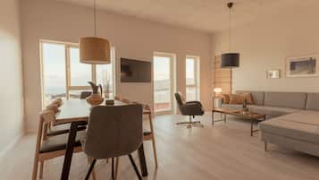 Apartment, 4 Bedrooms, Sea View | Living area | 40-inch flat-screen TV with satellite channels, streaming services