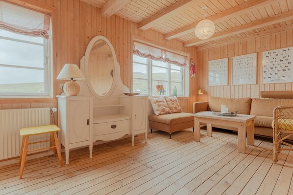 Hus | Oppholdsrom | En 40-tommers Flatskjerm-TV med Parabol-TV