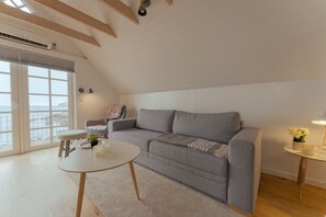 Habitació | Sala d'estar | Televisor de pantalla plana de 40 polzades amb canals per satèl·lit 