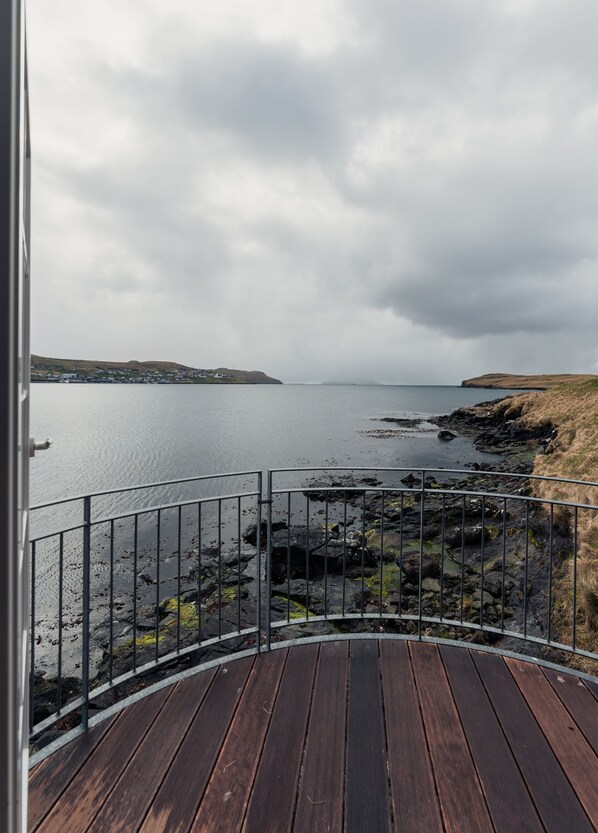 Room | Balcony view - Unique Boathouse By The Foreshore | Sea View (Strendur)