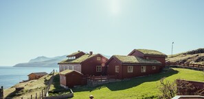 Front of property - Breathtaking View | 4-Br Home | Scenic Village (Stykkið)