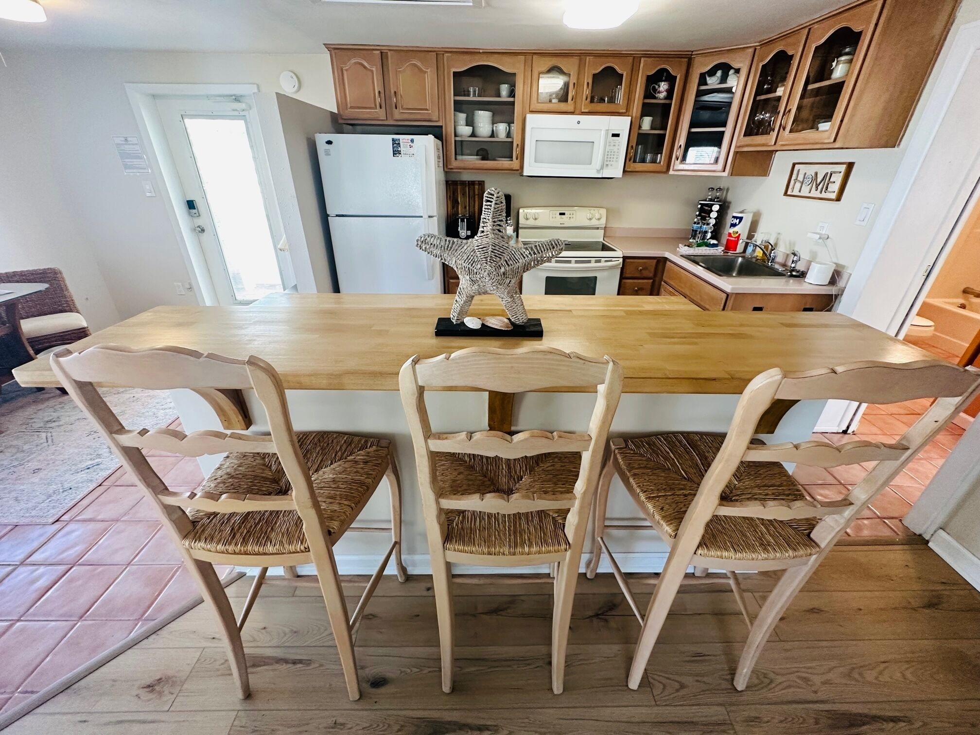 Microwave, coffee/tea maker, toaster, cookware/dishes/utensils