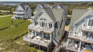 Enjoy expansive views from the multi-story buildings with large windows and gabled roofs.