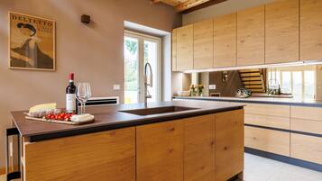Villa | Private kitchen | Full-sized fridge, microwave, oven, stovetop