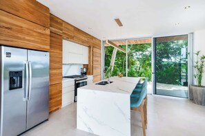 Fridge, microwave, oven, stovetop - Hilltop Villa: Ocean Views & Infinity Pool (Playa Grande)