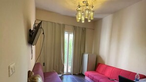 32-inch flat-screen TV with satellite channels - Apartment in Porto Sharm with Garden (Sharm El Sheikh)