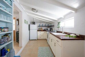 Cottage, 1 Bedroom | Private kitchen | Fridge, oven, coffee/tea maker, toaster