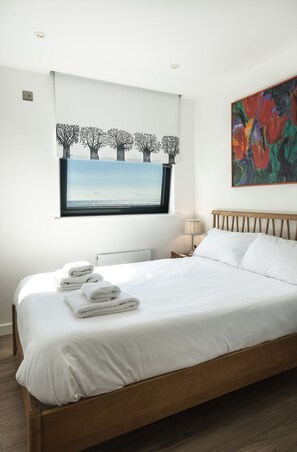 2 quartos, ferros/tábuas de passar roupa, Wi-Fi, roupa de cama