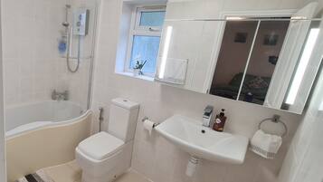 Hair dryer, towels, soap, shampoo