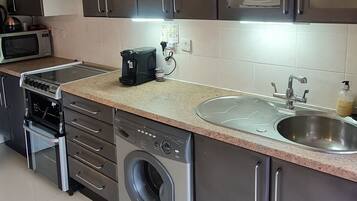 Microwave, toaster, cookware/dishes/utensils