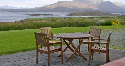 LOUGH CURRANE COTTAGE, pet friendly in Waterville, County Kerry