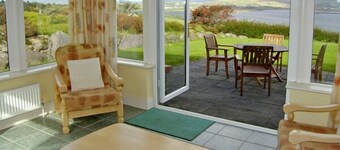 LOUGH CURRANE COTTAGE, pet friendly in Waterville, County Kerry