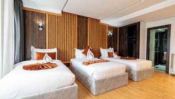 Junior Triple Room | 1 bedroom, Egyptian cotton sheets, premium bedding, minibar