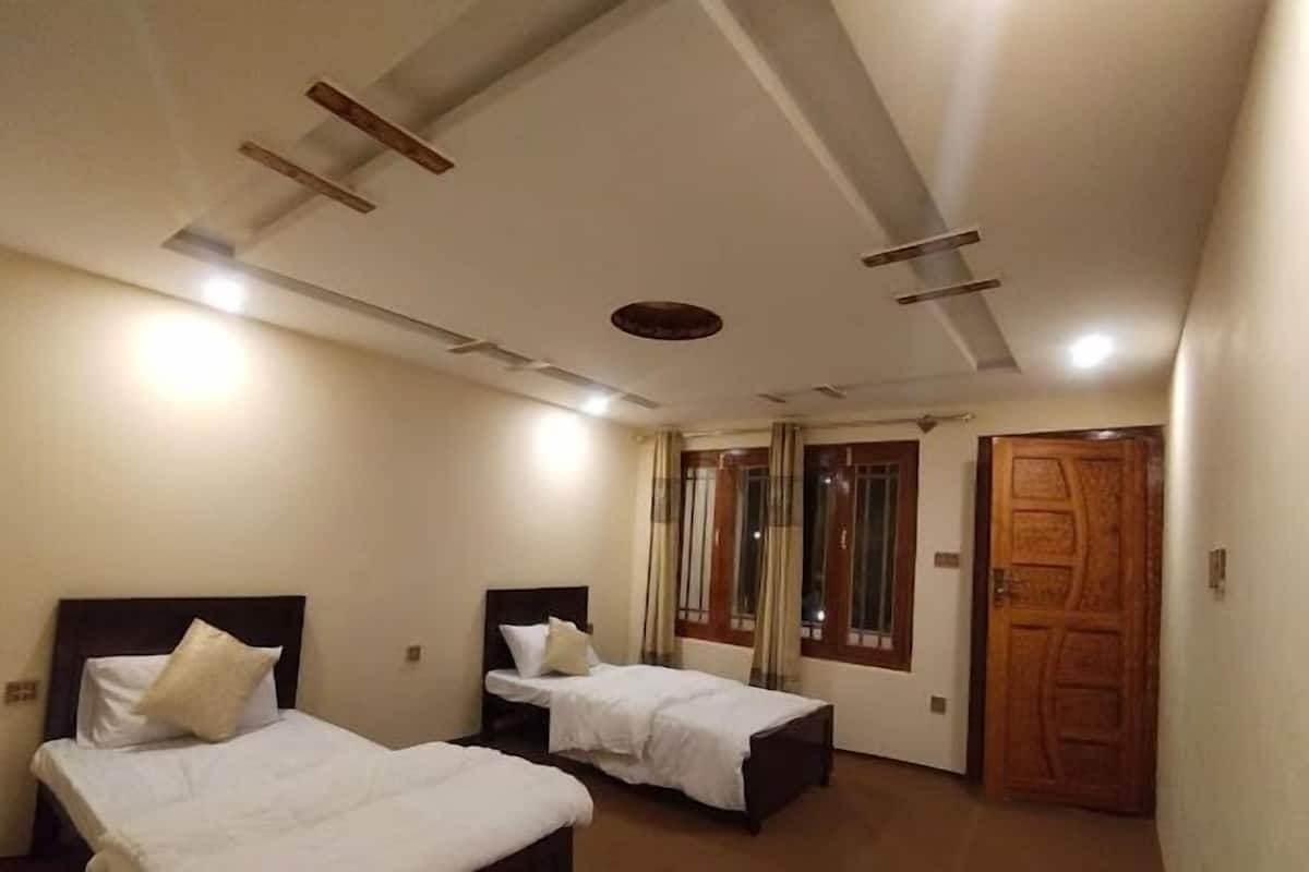 Chambre Double Deluxe | Chambres insonorisées, fer et planche à repasser, Wi-Fi gratuit