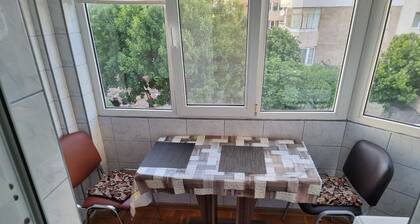 5 minutes to the beach! Family sized apartment with a nature park view.