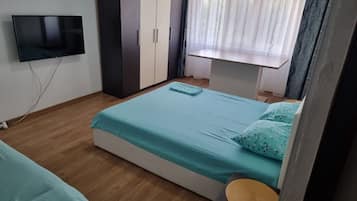 2 habitaciones, tabla de planchar con plancha, wifi y ropa de cama