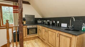 Fridge, electric kettle, toaster, cookware/dishes/utensils