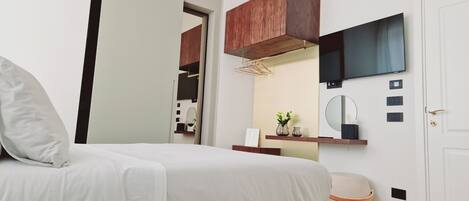 1 chambre, fer et planche à repasser, Wi-Fi gratuit, draps fournis