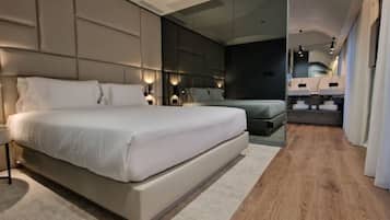 Ropa de cama de alta calidad, cubrecamas y minibar