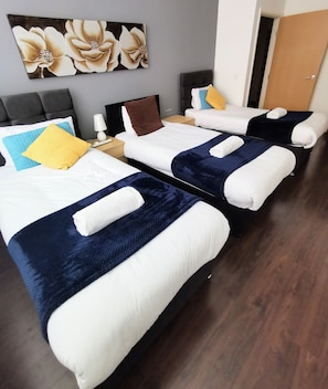 Departamento | 2 habitaciones, tabla de planchar con plancha y wifi gratis 
