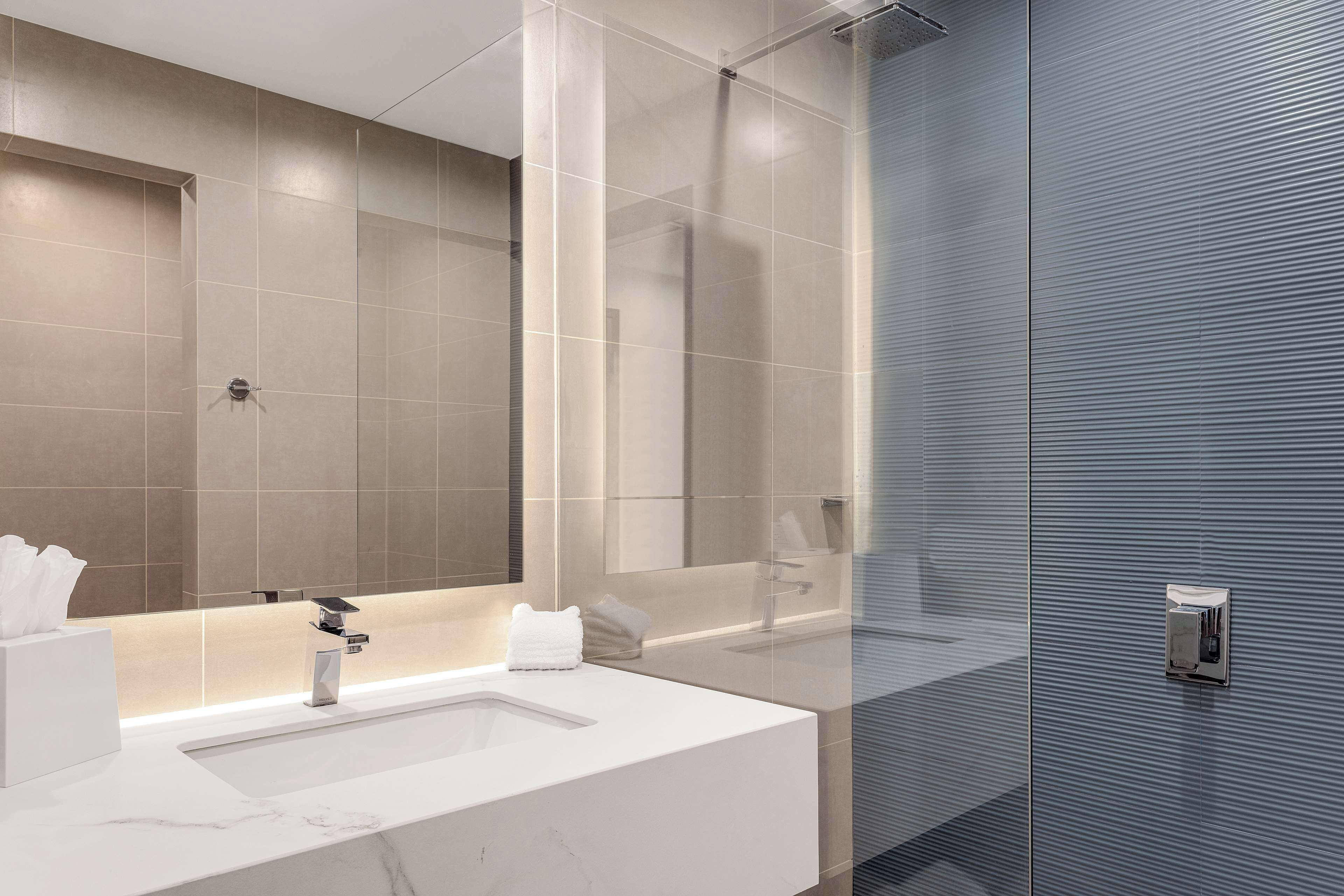 shower, rainfall showerhead, designer toiletries, hair dryer